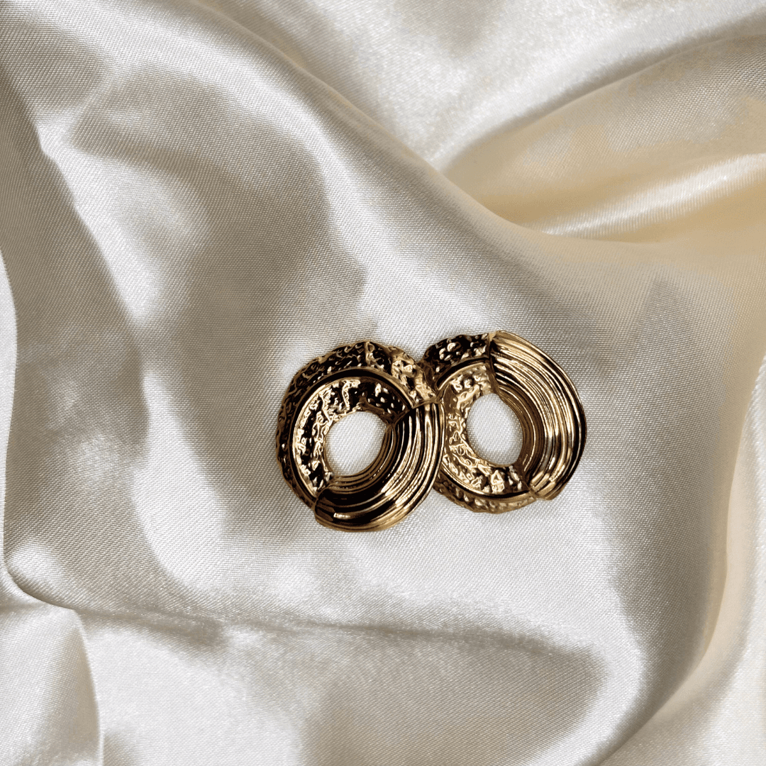 Boucle d’oreille Esso