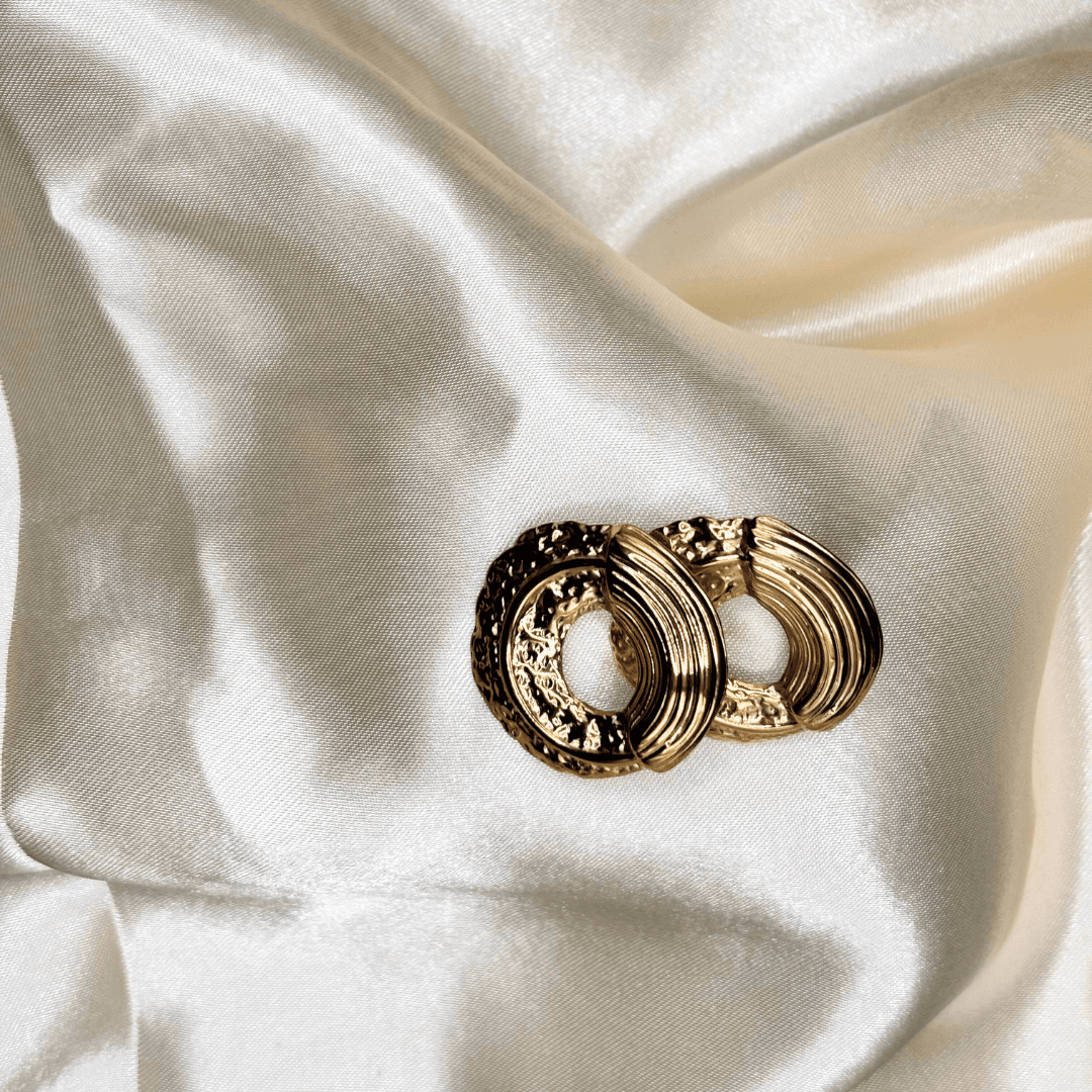 Boucle d’oreille Esso